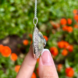 Colgante de plata nudo celta Trinity de mármol de Connemara